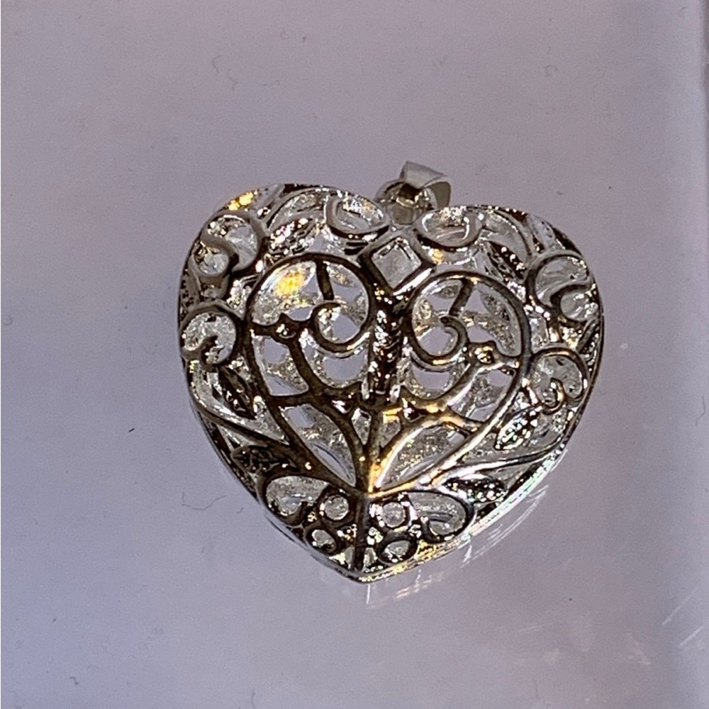 Elegant Silver Heart Pendant